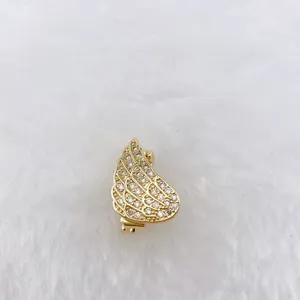 Exquisite rhinestone angel wing charm for DIY bracelet and strap decoration accessory.