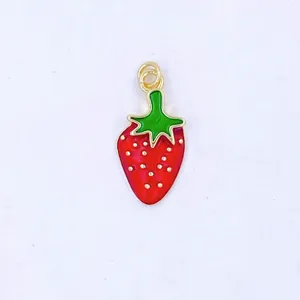 Cute strawberry charm pendant detail, golden trim enamel jewelry accessory for necklace making.