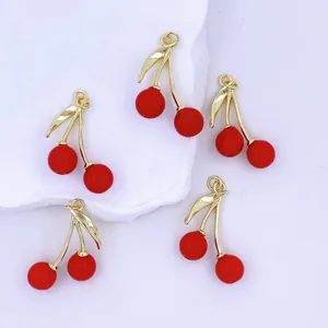 Red cherry metal charms for DIY jewelry making, earrings, and bag pendants detail view.