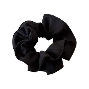 Klassieke zwarte stoffen haarrekkie voor dames, zacht elastisch haaraccessoire voor staart.