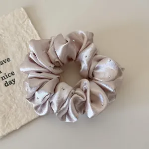 Satin rhinestone hair scrunchie, elegant pearl gloss fabric ponytail holder accessory.