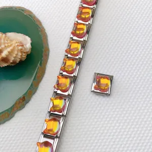 Stainless steel Italian charm bracelet with red crystal cat modules, DIY jewelry accessory.