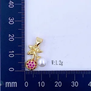 Gold-plated cherry pendant with micro-set red zirconia and white pearl, jewelry accessory.