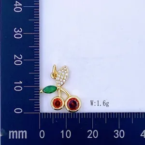 Micro-pave zircon cherry pendant charm, gold-plated metal fashion jewelry accessory, 1.6g.