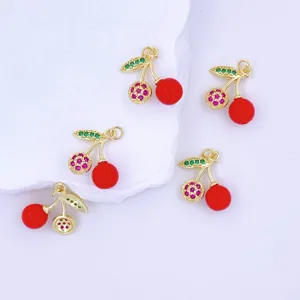 Cherry charm detail shot featuring red gemstone and green zirconia metal diy pendant accessories.