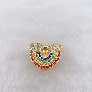 Detailed view of a gold-plated colorful rhinestone cloud rainbow metal DIY accessory.