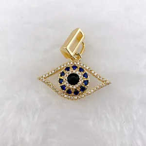Gold evil eye pendant charm with blue and white zircon stones sparkling jewelry accessory