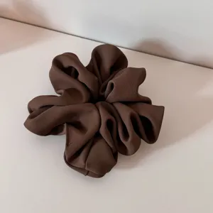 Brown satin hair scrunchie, elegant large hair tie for women and girls daily styling.