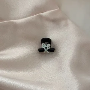 Stylish Black Mini Hair Claw Clip featuring a Silver Bow, Chic Alloy Bangs Clip for Women