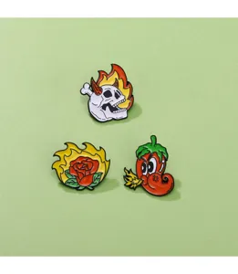 Punk style enamel pins set featuring burning skull, rose, and pepper designs for apparel.