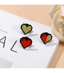 Close-up detail of cute pixel heart alloy brooch pins, sweet style enamel badge for bags.