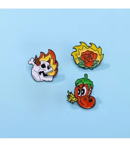 Punk style enamel pins set featuring flaming skull, rose, and chili pepper alloy badges.