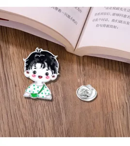 Cute cartoon boy metal enamel pin detail shot, perfect for backpack and clothing decoration.