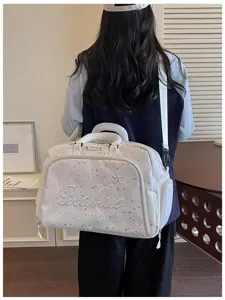 Large capacity travel duffel bag for women, stylish star pattern weekender shoulder bag.