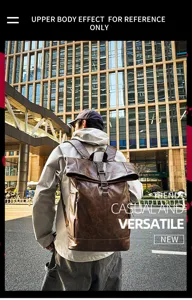 Detailed view of vintage brown leather roll-top backpack worn outdoors, stylish urban street style.