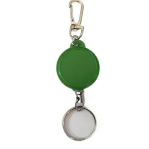Detailed view of the green retractable badge reel with metal hook and keyring for id cards.