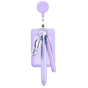 Purple nurse badge reel set with retractable holder, pen and mini scissors detail.