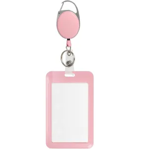 Enrouleur de badge rétractable rose avec porte-carte d'identité vertical et mousqueton pour bureau.