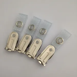 Detail view of 4 metal badge clips with clear straps, durable hardware ID card accessories.
