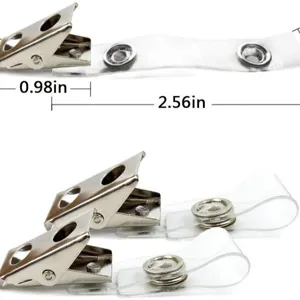 Metal badge clips with clear plastic straps and snap buttons for standard ID card holders.