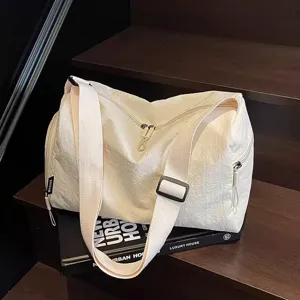 Casual large capacity travel duffel bag for women, lightweight sports gym shoulder bag.
