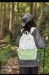 Lightweight outdoor travel backpack for women, large capacity stylish school bag for daily use.