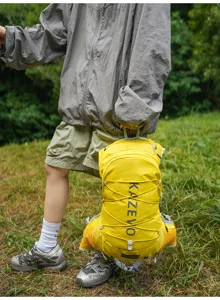 Outdoor hiking backpack detail view, bright yellow tactical vest design with white bungee cords.
