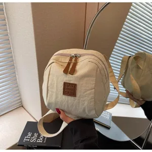 Sac coquillage léger en nylon pour femme, design minimaliste décontracté, sac bandoulière portable.