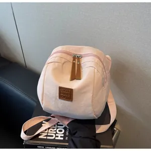 Sac bandoulière léger en nylon rose pour femmes, sac épaule coquillage simple casual quotidien.