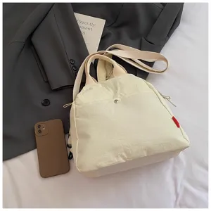 Casual canvas backpack for women, stylish minimalist sling bag and everyday travel bag.