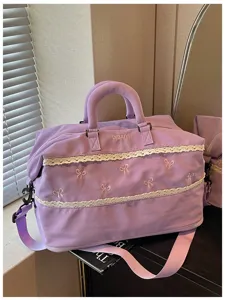 Large capacity travel duffel bag light purple canvas with cute bows and lace trim for women daily.