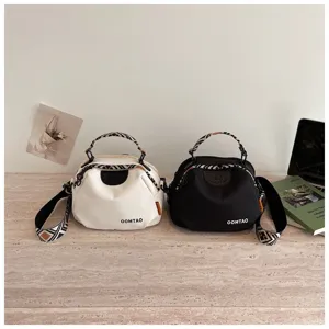 Lässige Canvas Muschel Umhängetasche für Damen, stilvolle kleine Handtasche mit Muster.