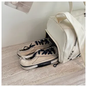 Canvas travel duffel bag with separate shoe compartment, casual gym sports luggage bag detail.