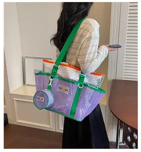 Detailed view of the large mesh beach tote bag with wet dry separation and matching pouch.