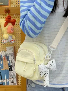 Summer Japanese style canvas crossbody bag for women, multi-pocket casual shoulder bag.