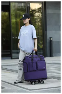 Gran capacidad bolsa de viaje rodante con ruedas universales para equipaje y viajes.