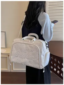 Large capacity women's travel duffel bag with star pattern, ideal for short trips and cabin use.