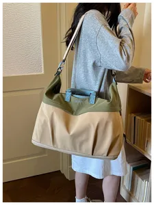Bolso de viaje grande para mujer, elegante bolsa de fin de semana color-block con correa.