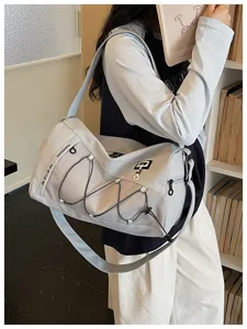 Grey travel gym duffel bag for women with wet dry separation and comfortable shoulder straps.