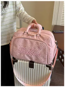 Pink star travel duffel bag detail, embroidered letter design, portable luggage bag for women.