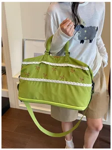 Large capacity green travel duffel bag with cute bows and lace trim for short trips and gym.