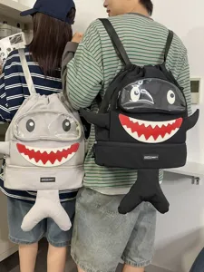 Cute cartoon shark backpack for students, large capacity outdoor travel bag with clear window.