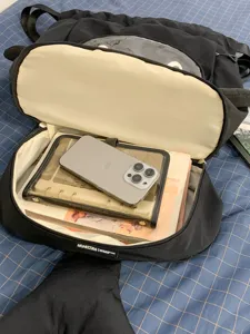 Black casual student backpack with clear window, large capacity daily travel school bag.