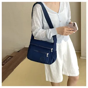 Oxford cloth multi-pocket crossbody bag detail, spacious daily shoulder bag design.