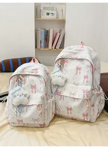 Cute white backpack with pink bows and plush keychain for teen girls school daily travel use