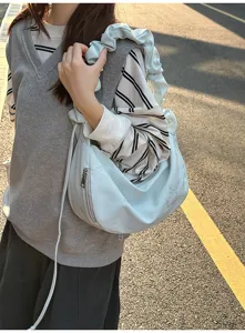 Cute light blue shoulder bag for women, casual ruffled strap cloud hobo bag, stylish daily handbag.