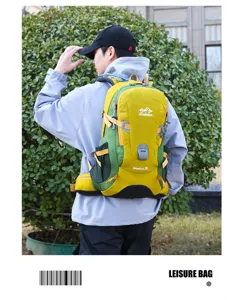 Detail view of the 35L outdoor hiking backpack in green and yellow, designed for camping and travel.