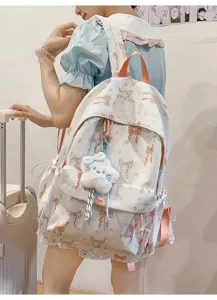 Japanese style sweet bow print backpack for school girls, large capacity travel daily use.