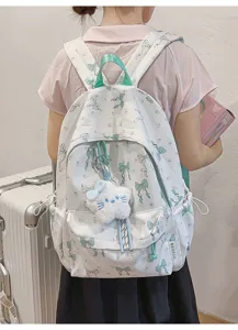 Japanese sweet white backpack with blue bow print and cute plush cat pendant, school bag.