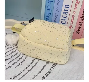 Cute aesthetic yellow star print crossbody bag casual shoulder bag for women daily use.
